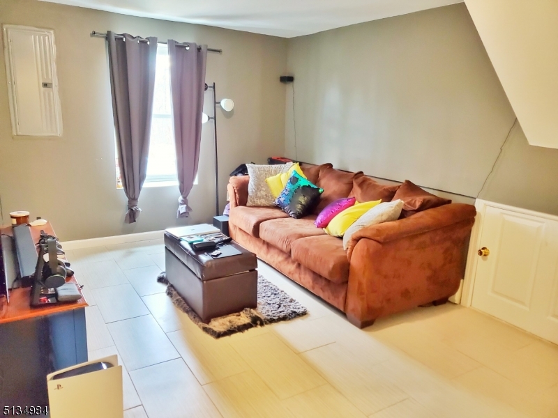 512 Riverside Drive Cranford, NJ 07016 - Photo 21 of 22 a living room with furniture and a window