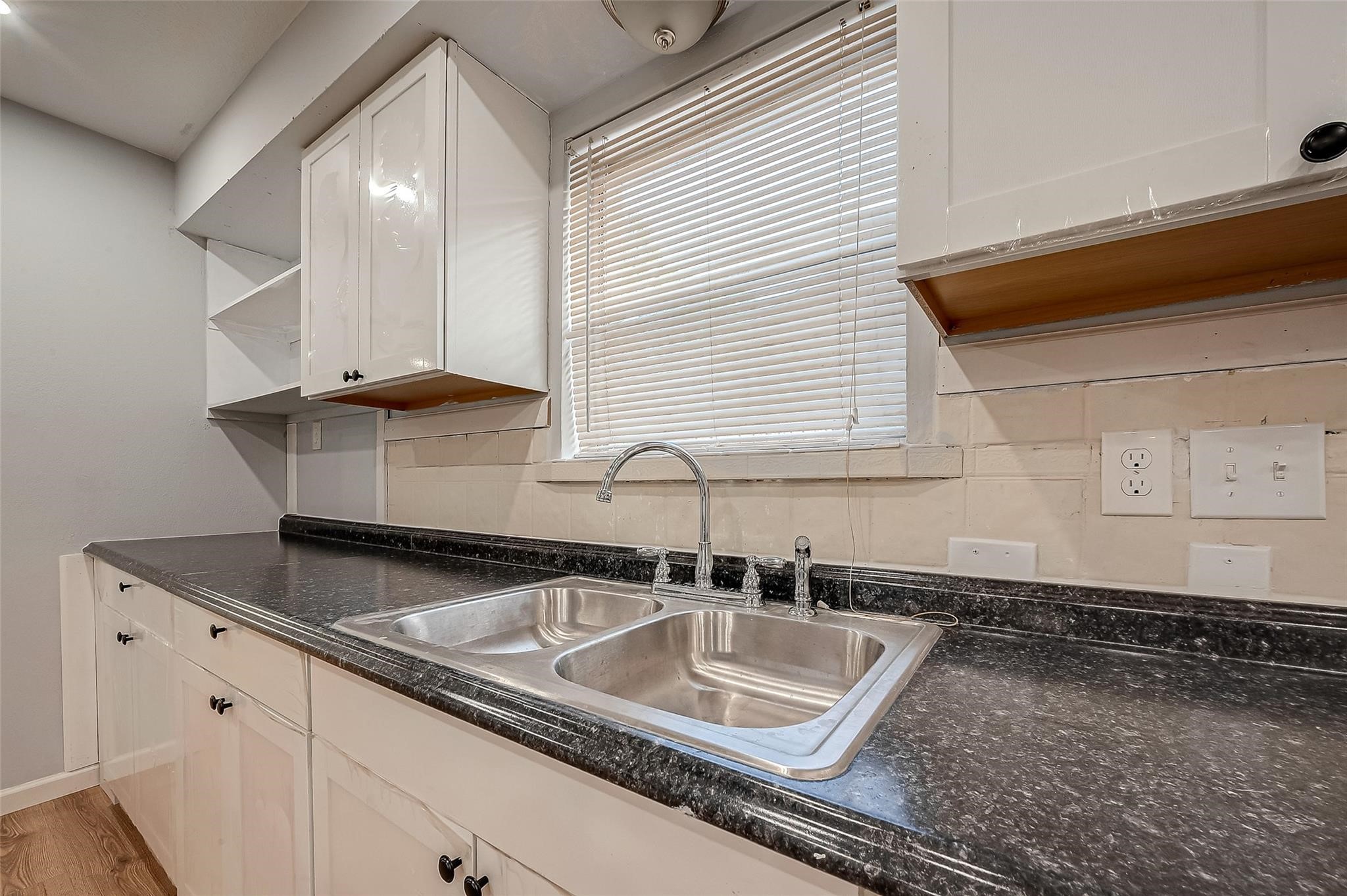 23131 Earlmist Drive Spring, TX 77373 - Photo 15 of 34 a kitchen with granite countertop a sink and a stove