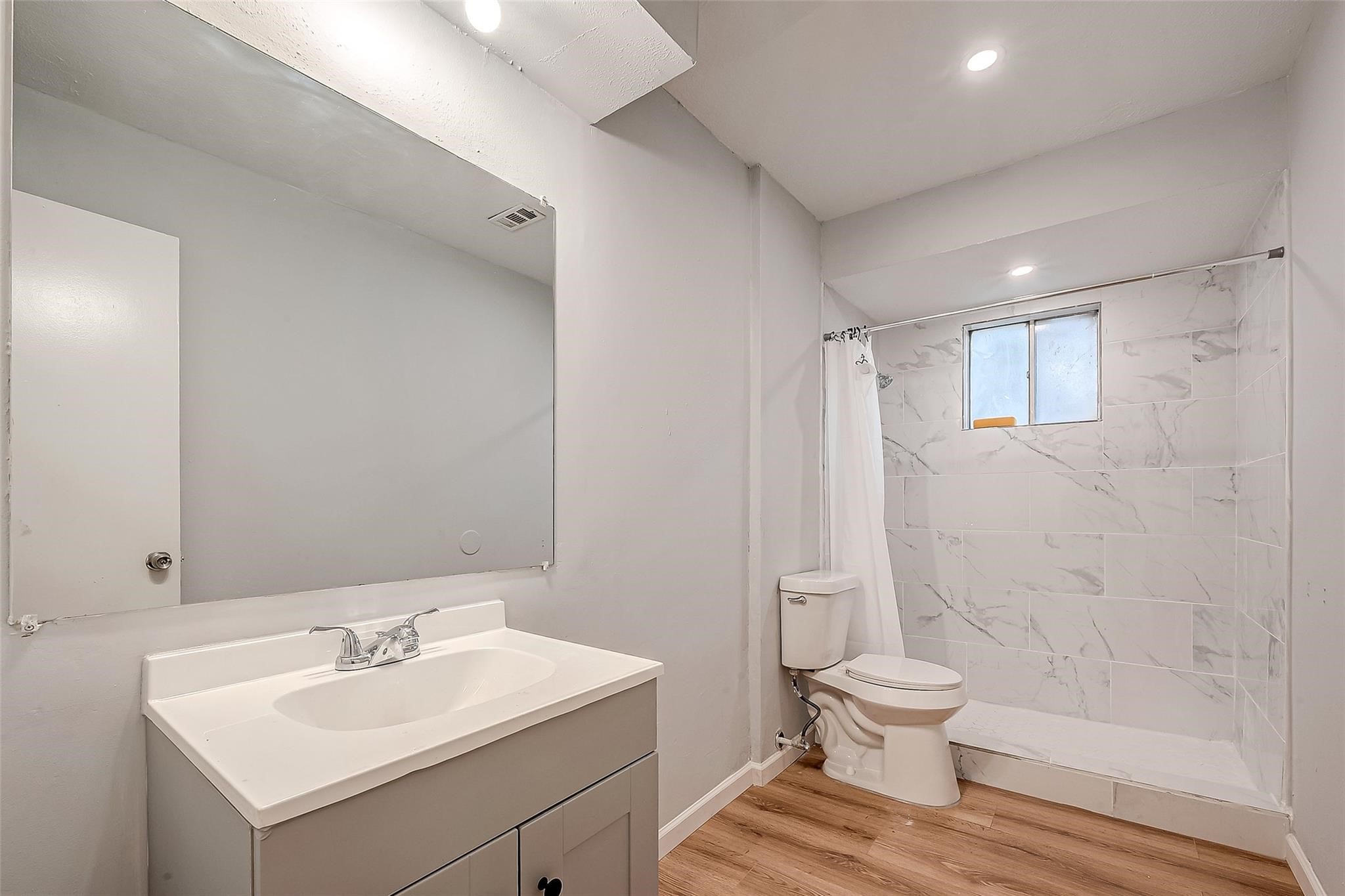 23131 Earlmist Drive Spring, TX 77373 - Photo 23 of 34 a bathroom with a sink toilet and shower
