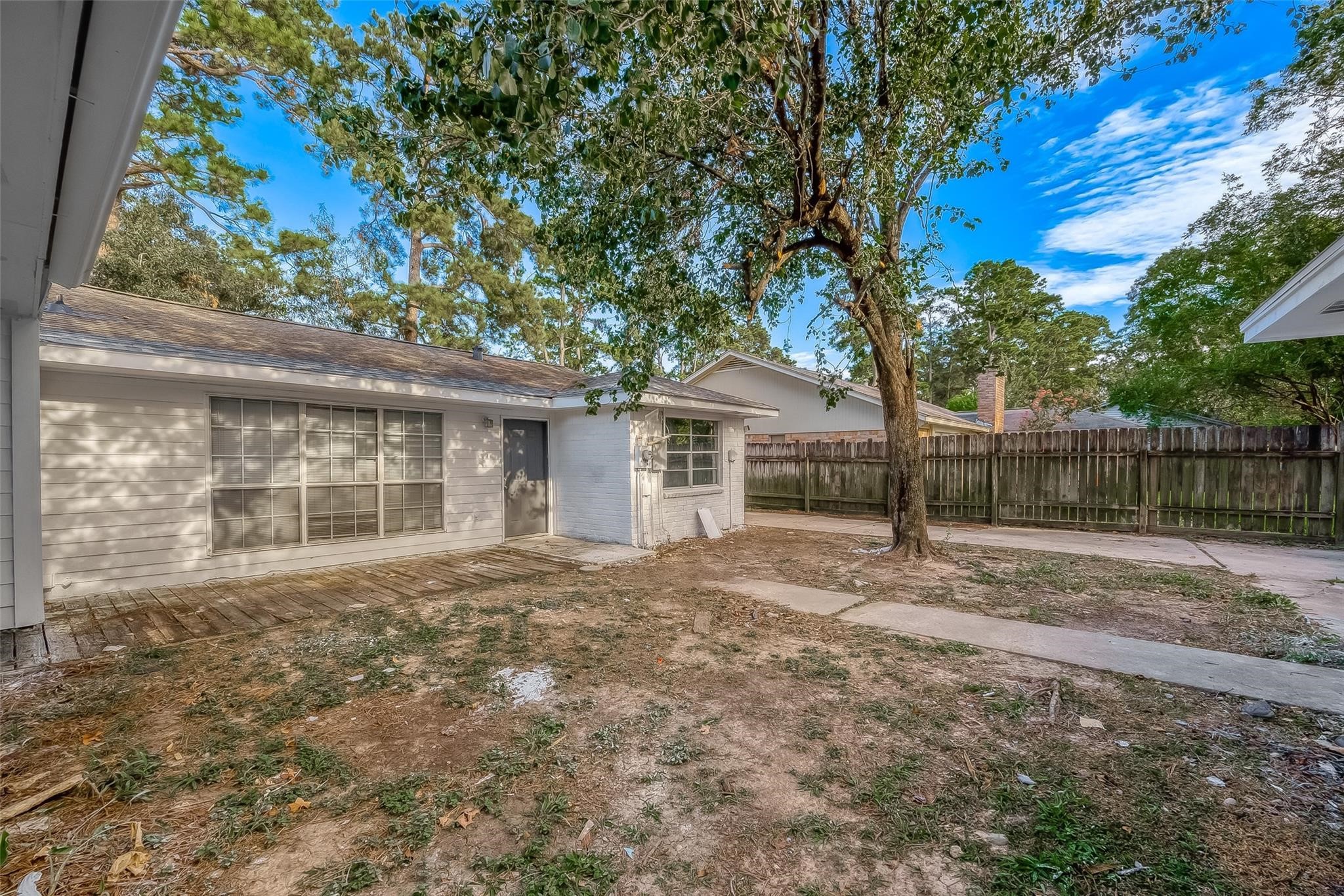 23131 Earlmist Drive Spring, TX 77373 - Photo 30 of 34 a view of a house with a yard