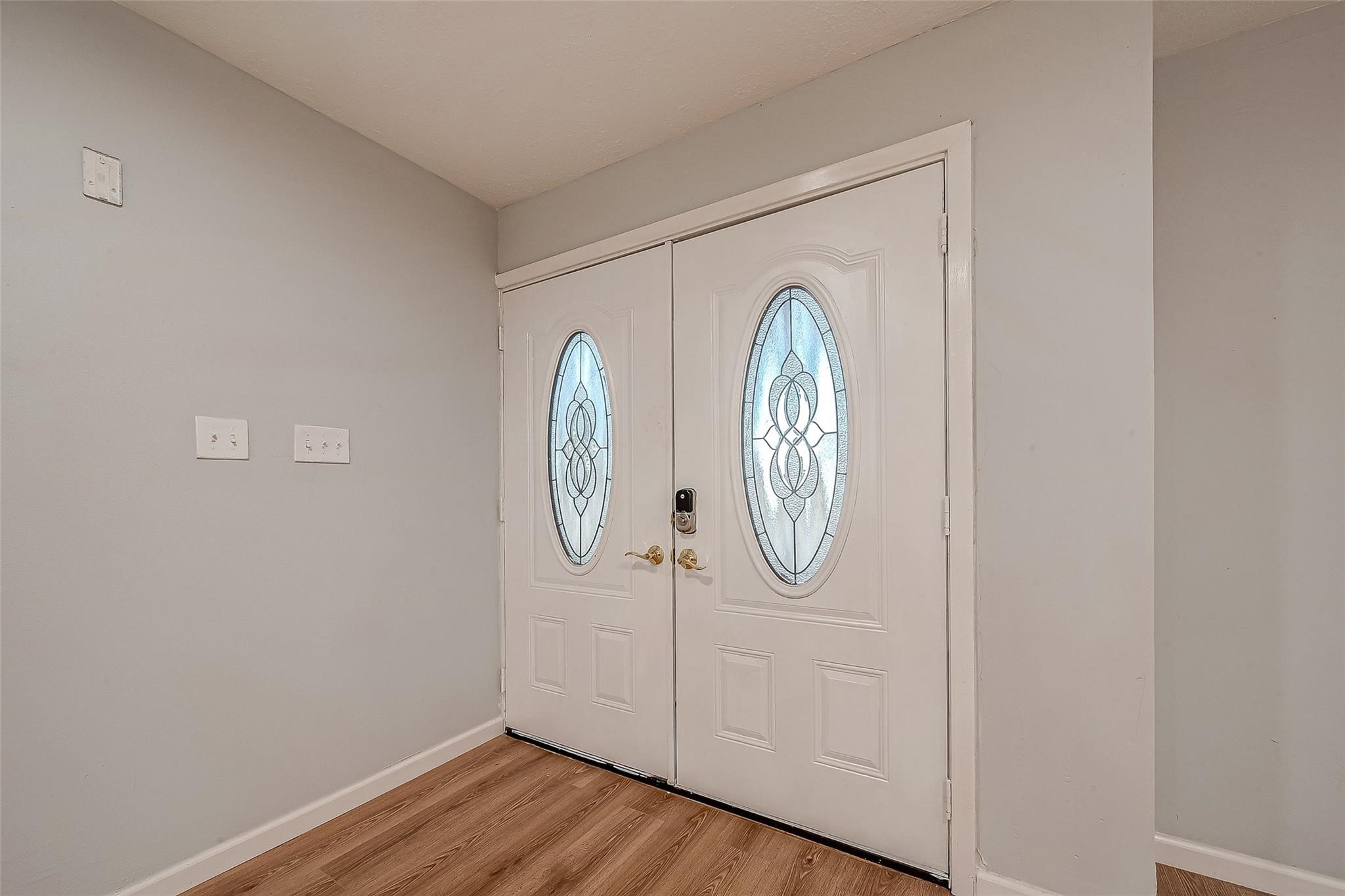 23131 Earlmist Drive Spring, TX 77373 - Photo 6 of 34 a view of a hallway with wooden floor