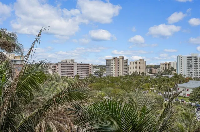 a view of a balcony with city view