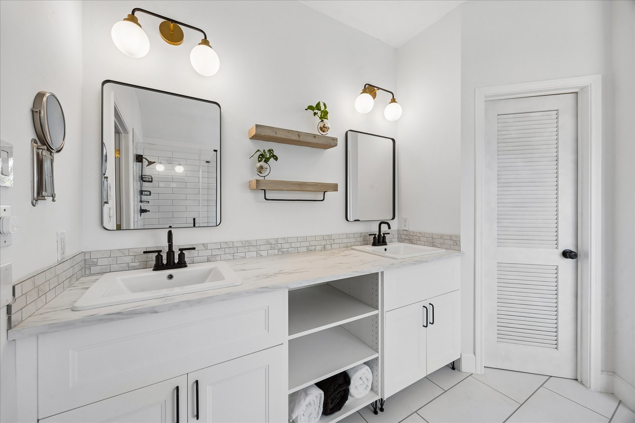 7919 Clarion Way Houston, TX 77040 - Photo 15 of 23 Lovely double-sink vanity with generous cabinet storage.