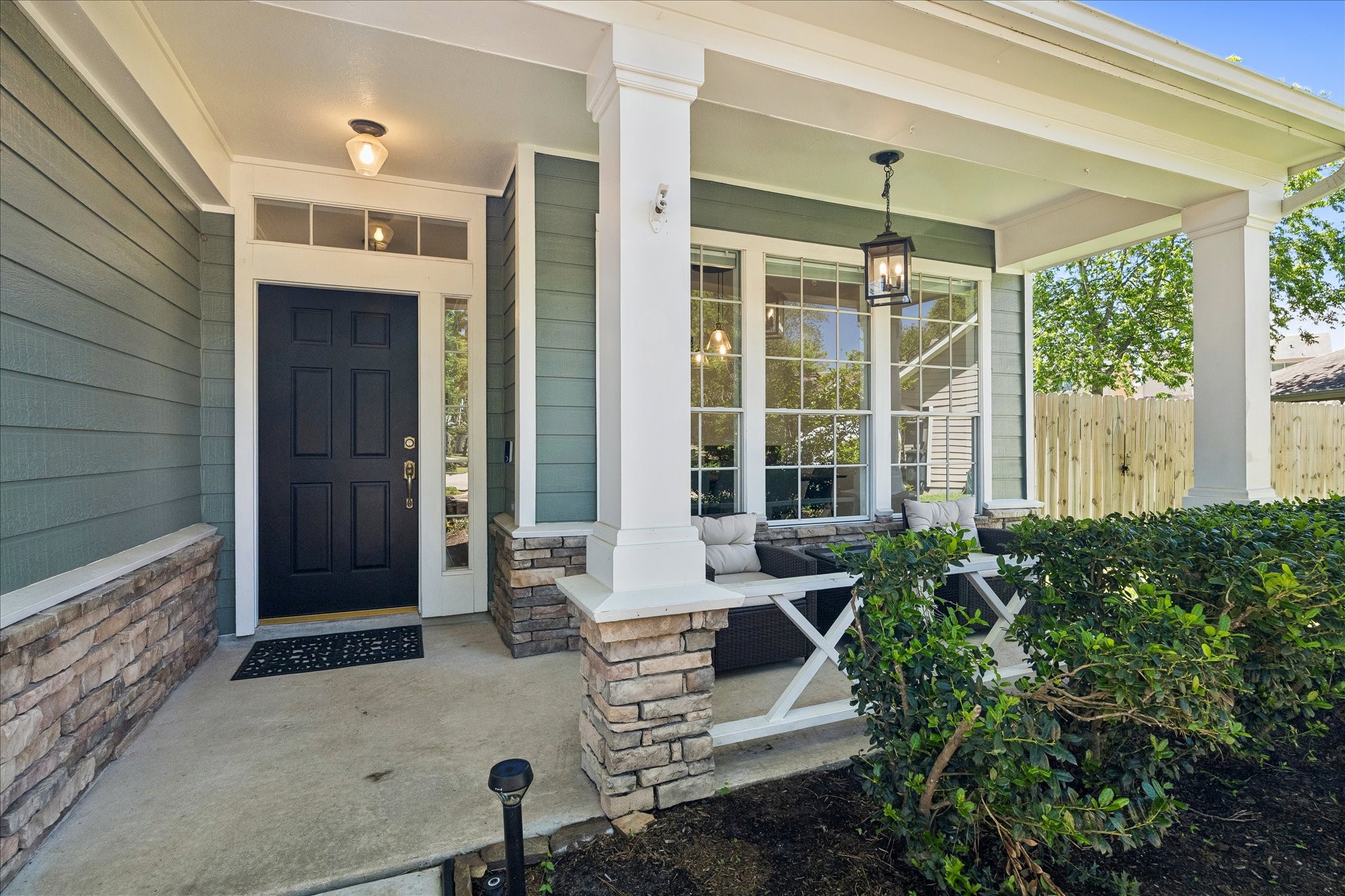 7919 Clarion Way Houston, TX 77040 - Photo 2 of 23 A peaceful covered front porch greets you upon arrival.