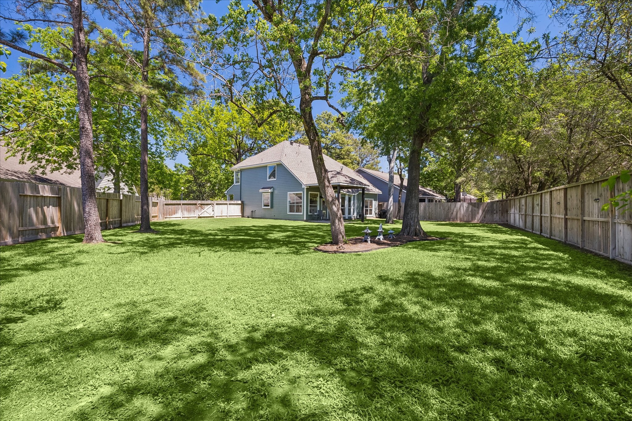 7919 Clarion Way Houston, TX 77040 - Photo 22 of 23 Oversized backyard offers endless possibilities—add a pool, playset, garden, or create your dream outdoor retreat.