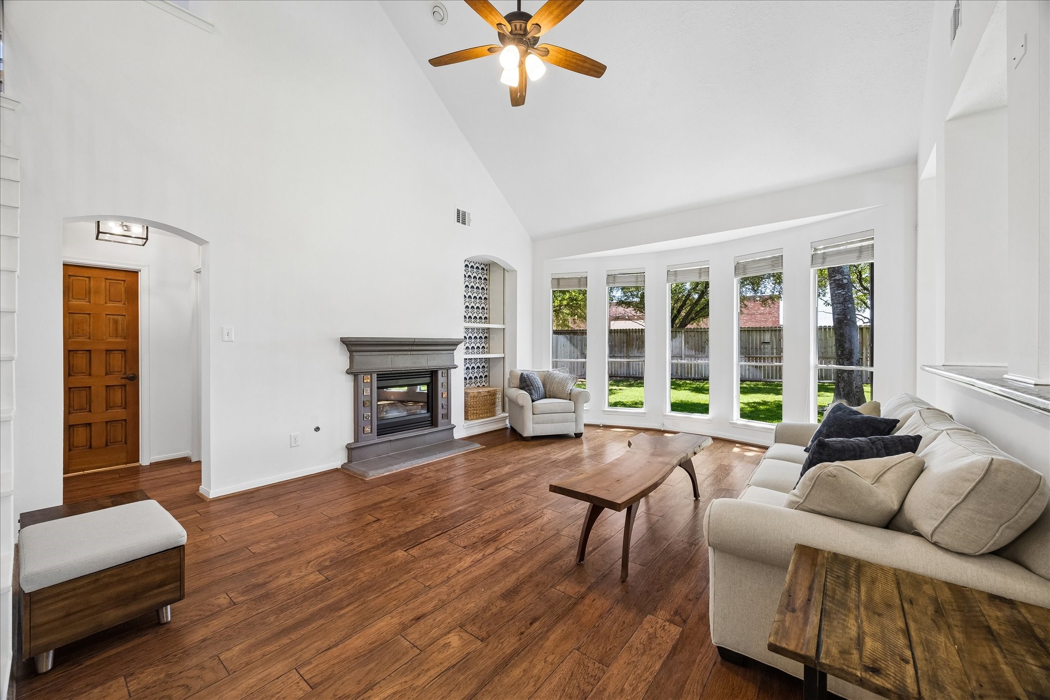 7919 Clarion Way Houston, TX 77040 - Photo 6 of 23 The family room overlooks the large backyard and offers sun-lit, airy living space.