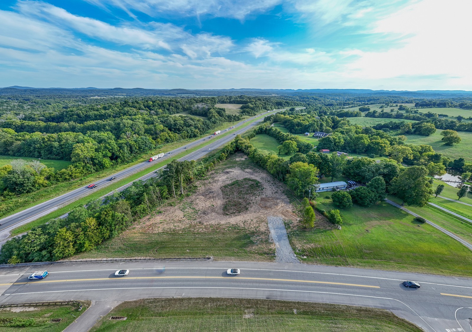 0 Murfreesboro Road College Grove, TN 37046 - Photo 1 of 11 a view of a yard from a balcony