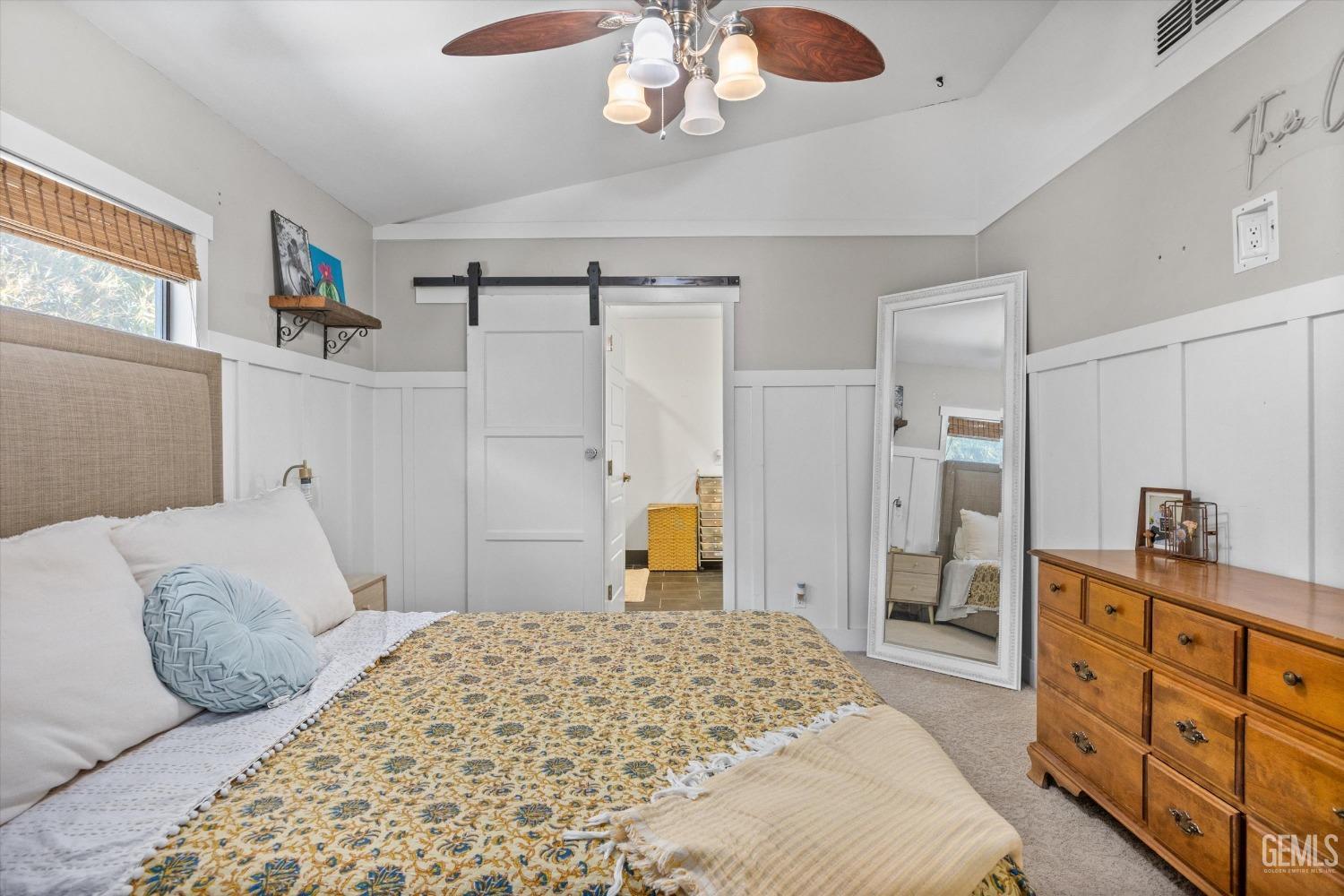 Undisclosed Address Bakersfield, CA 93306 - Photo 21 of 39 a bedroom with a bed and a dresser