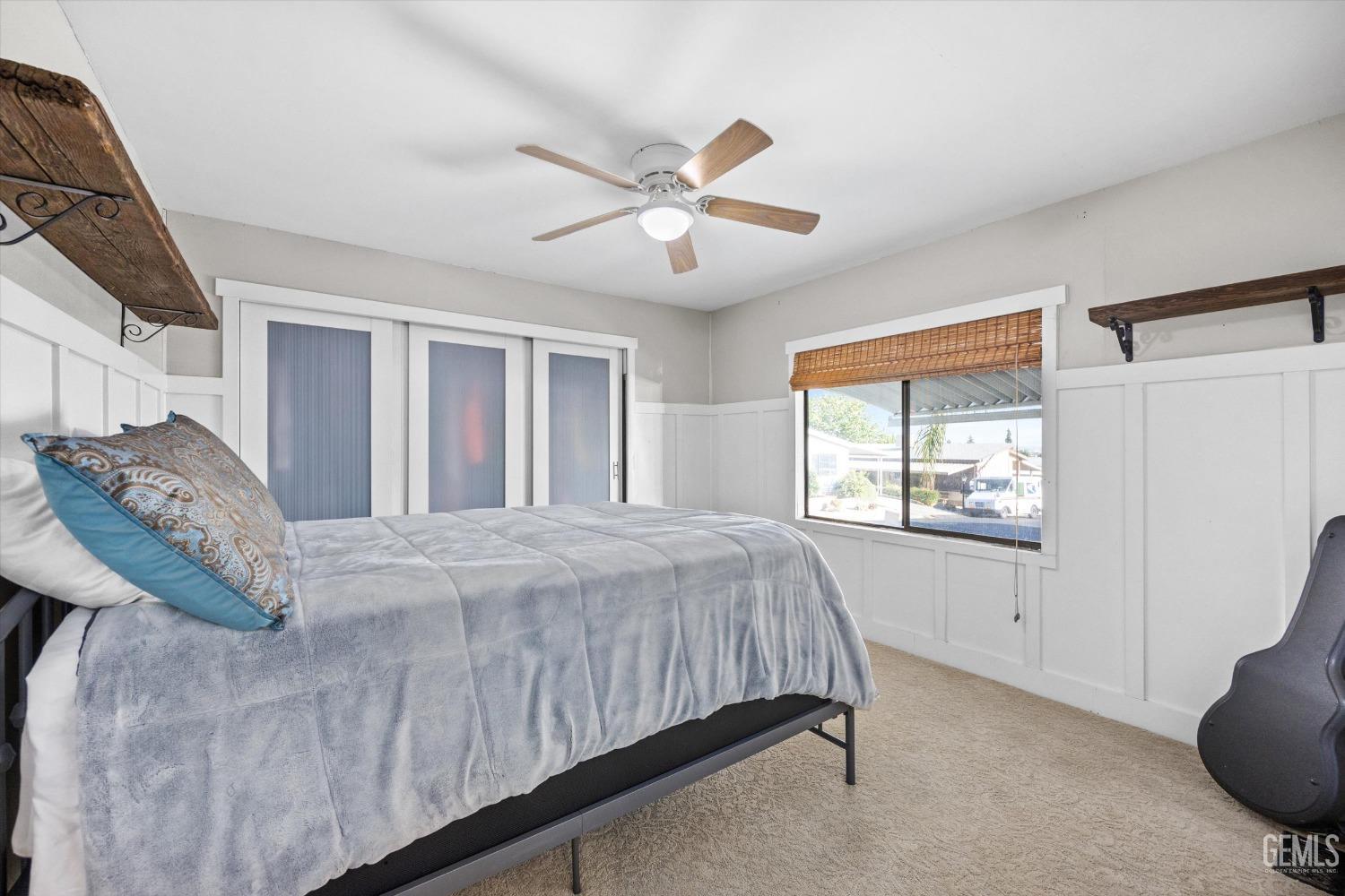 Undisclosed Address Bakersfield, CA 93306 - Photo 25 of 39 a bedroom with a bed and a window