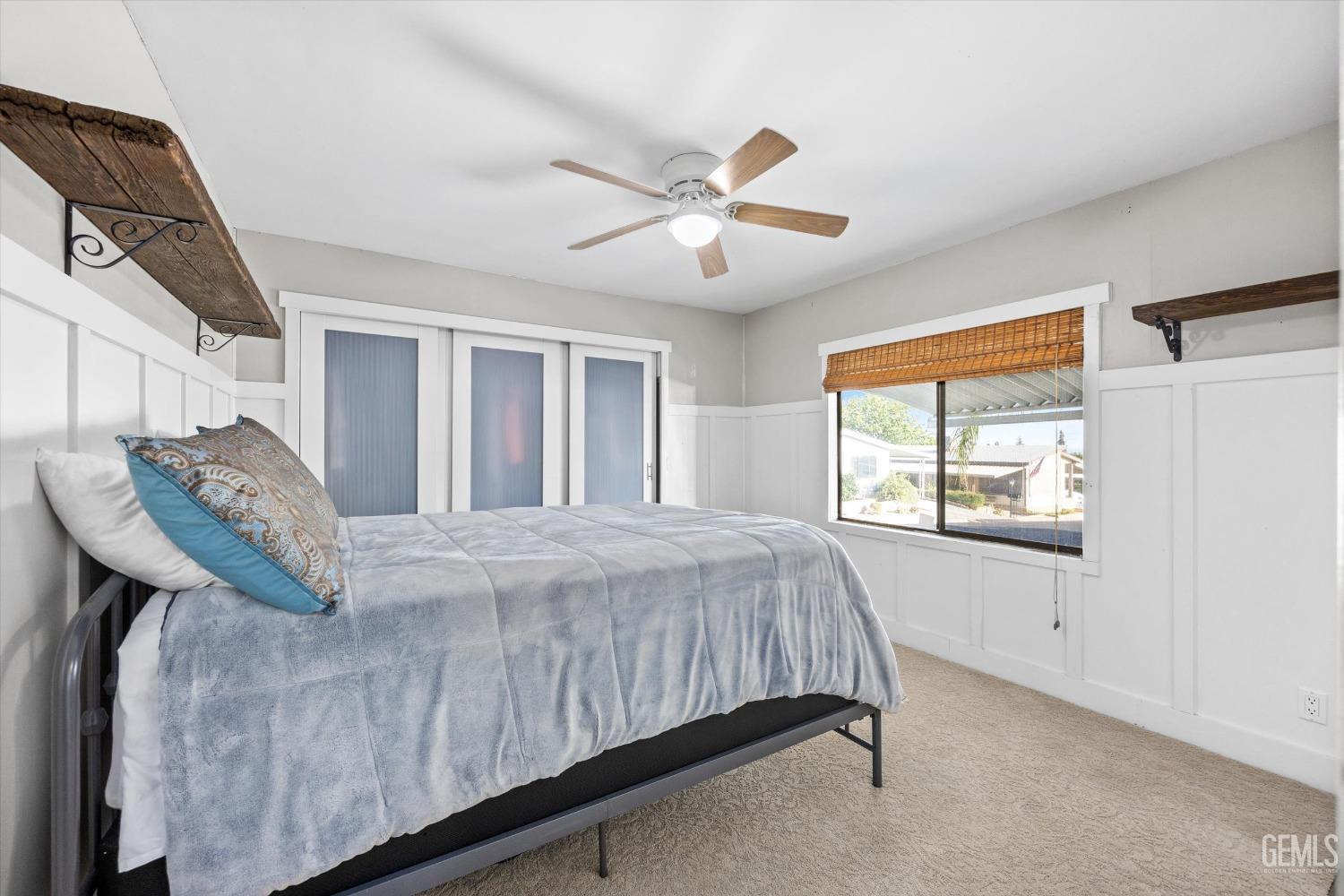 Undisclosed Address Bakersfield, CA 93306 - Photo 26 of 39 a bed sitting in a bedroom next to a window