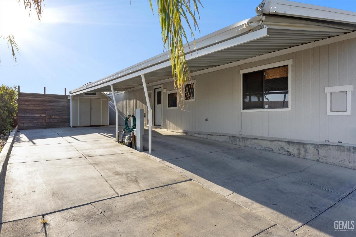 Undisclosed Address Bakersfield, CA 93306 - Photo 3 of 39 a view of a backyard space