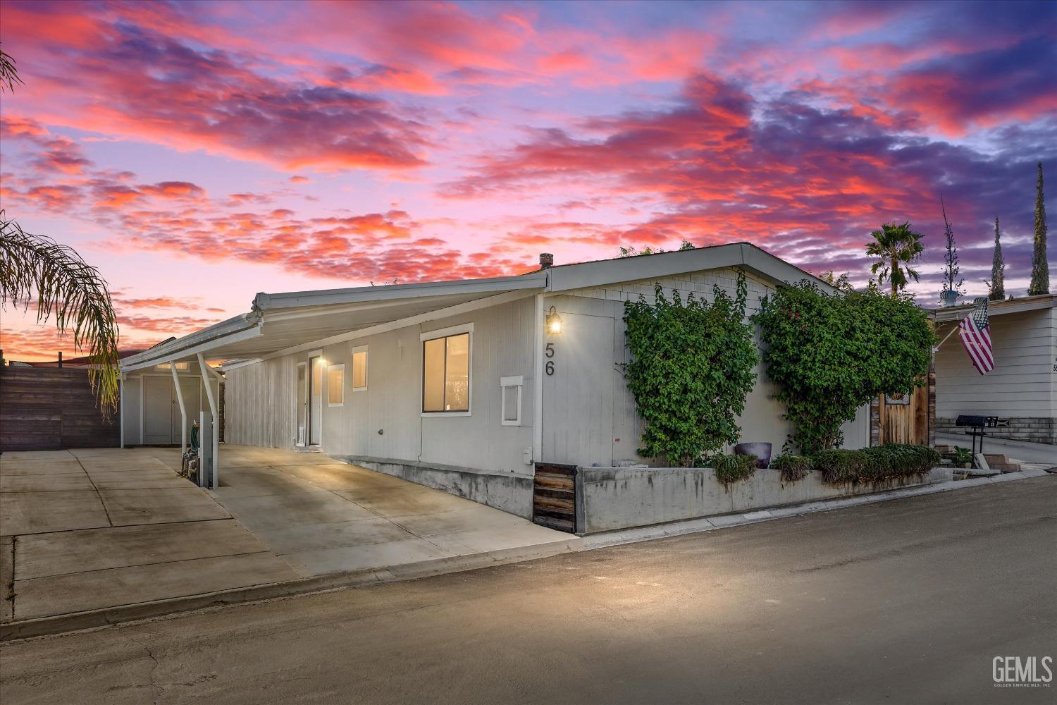 Undisclosed Address Bakersfield, CA 93306 - Photo 39 of 39 a front view of a house with a garage