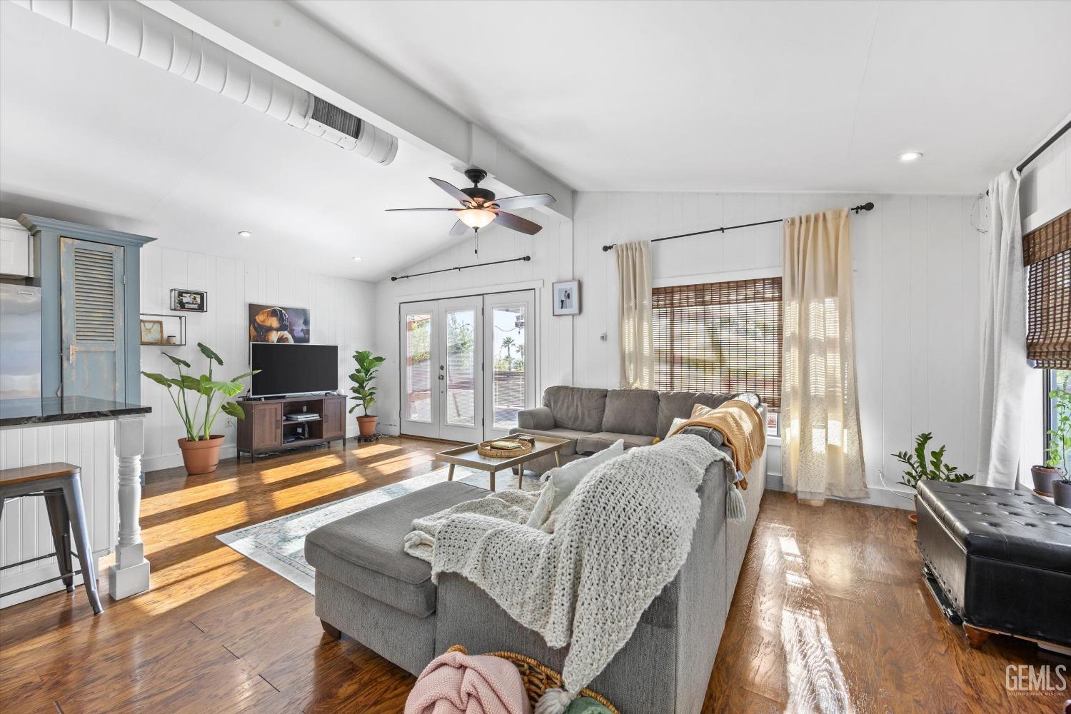 Undisclosed Address Bakersfield, CA 93306 - Photo 4 of 39 a living room with furniture and a flat screen tv