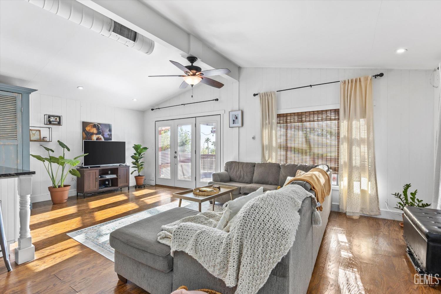 Undisclosed Address Bakersfield, CA 93306 - Photo 5 of 39 a living room with furniture and a fireplace