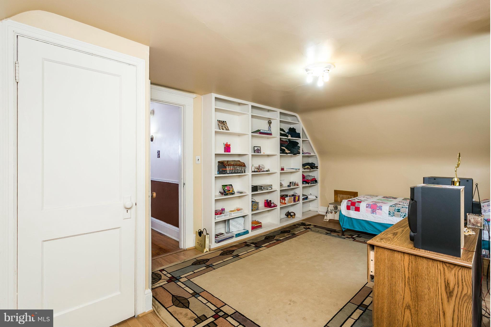 109 Woodlawn Road Baltimore, MD 21210 - Photo 22 of 30 Bedroom 5 (with built-in shelving)