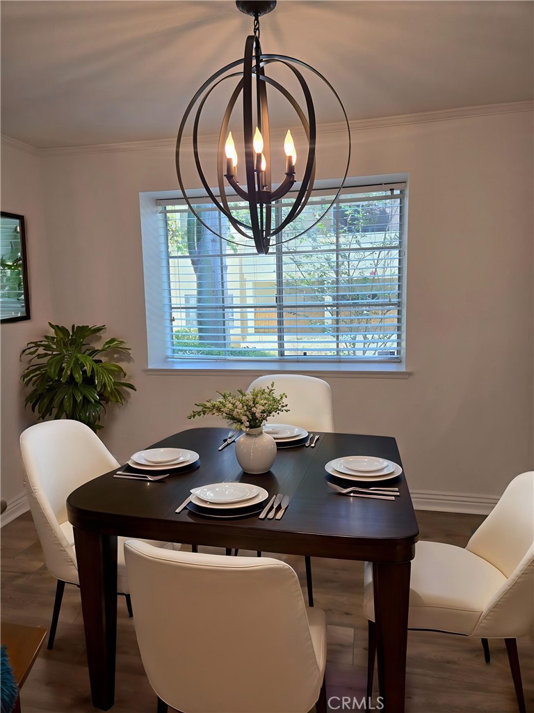 4201 Las Virgenes Road, Unit 114 Calabasas, CA 91302 - Photo 9 of 27 Dining room virtually staged