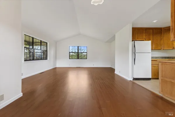 a view of gym equipment with windows