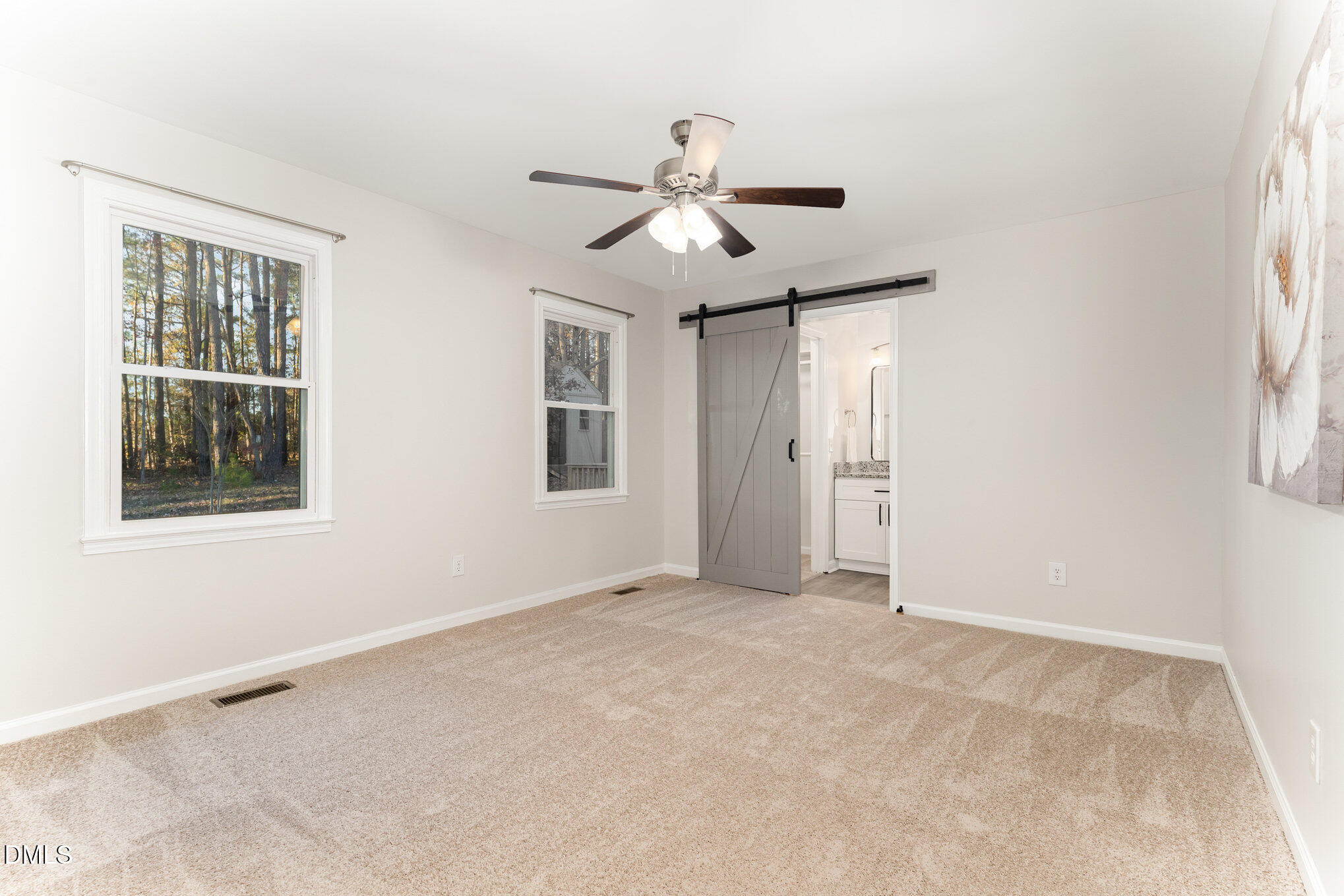 7717 Cart Track Trail Raleigh, NC 27615 - Photo 13 of 18 a view of an empty room with a window