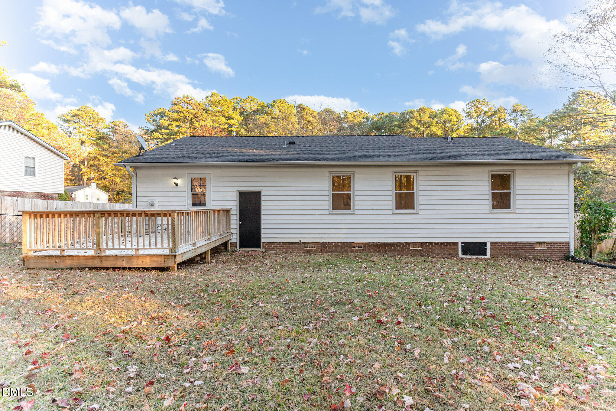7717 Cart Track Trail Raleigh, NC 27615 - Photo 18 of 18 a view of a house with a yard