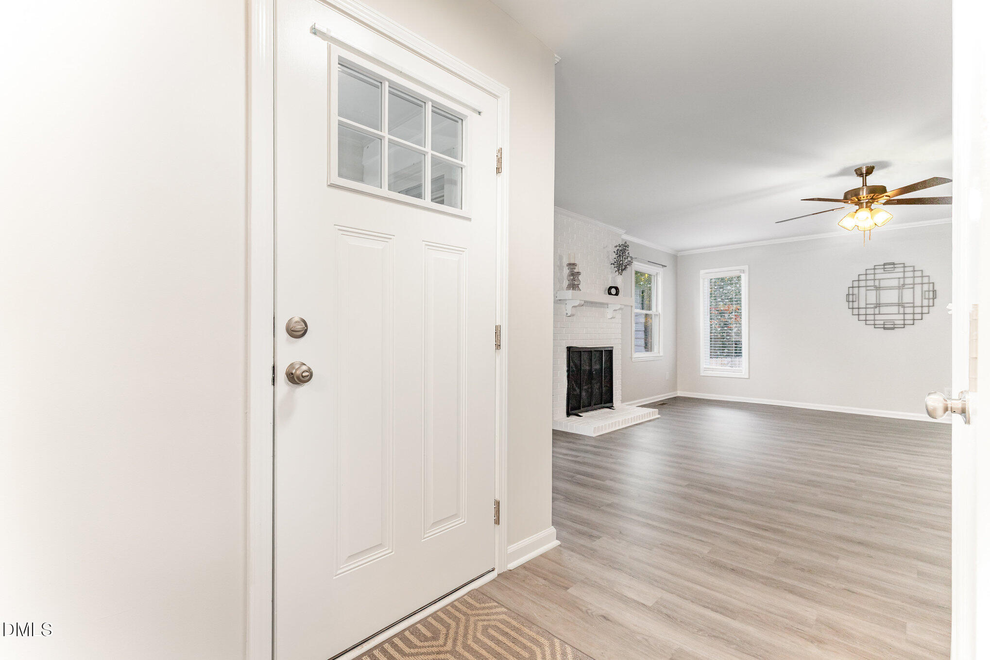 7717 Cart Track Trail Raleigh, NC 27615 - Photo 3 of 18 a view of a livingroom with wooden floor