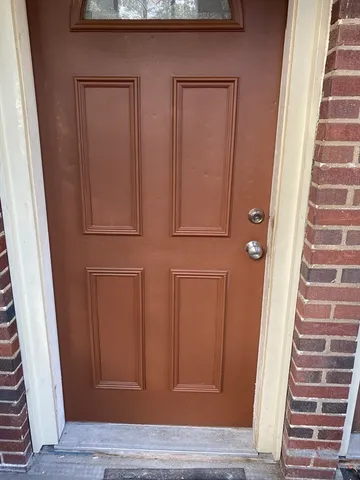 a view of front door with stairs