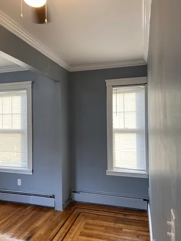 a view of a room that has a window