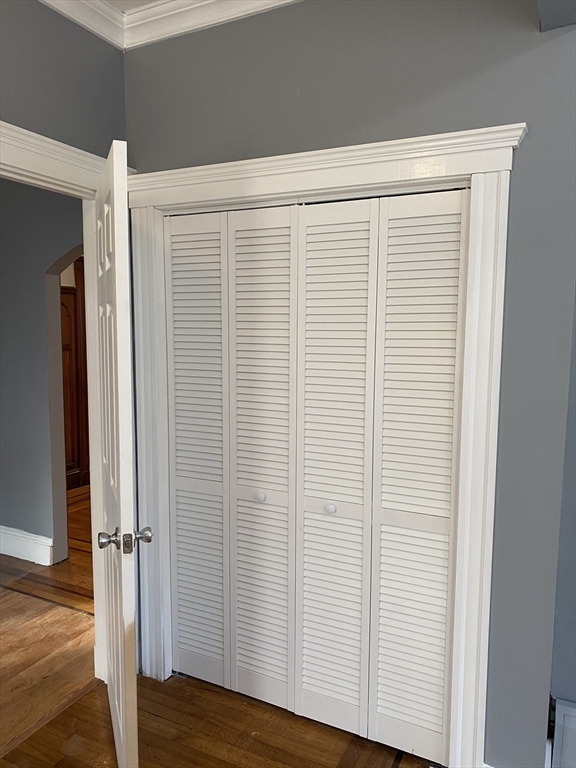 39 Pasadena Road, Unit 2 Boston, MA 02121 - Photo 14 of 29 a view of front door with wooden floor