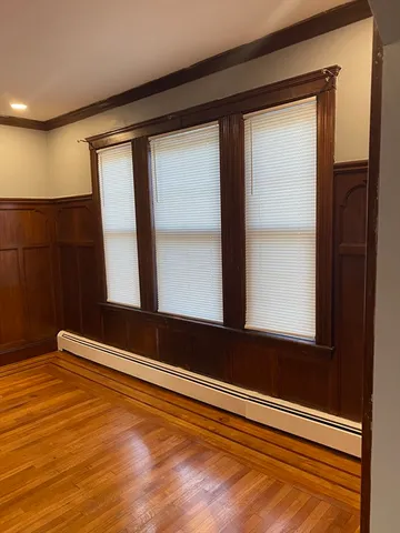 a kitchen with a sink and a refrigerator
