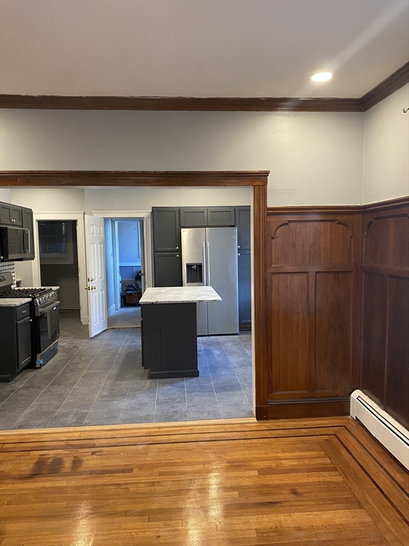 39 Pasadena Road, Unit 2 Boston, MA 02121 - Photo 16 of 29 a kitchen with a sink and a refrigerator