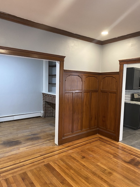 39 Pasadena Road, Unit 2 Boston, MA 02121 - Photo 17 of 29 a view of a room with wooden floor
