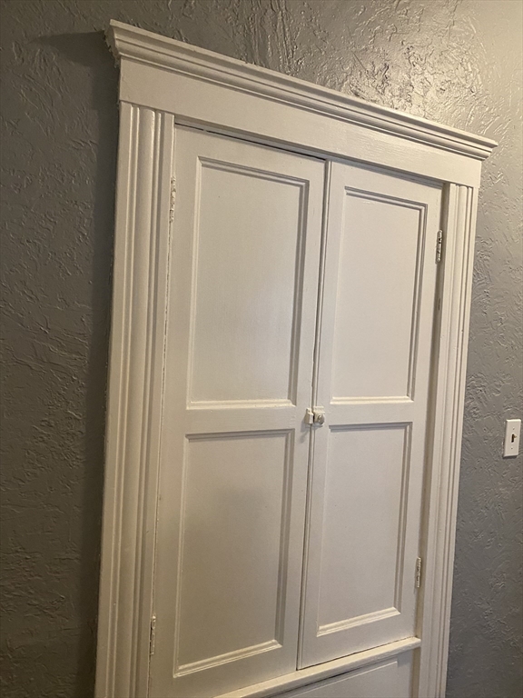 39 Pasadena Road, Unit 2 Boston, MA 02121 - Photo 22 of 29 a bathroom with a glass door