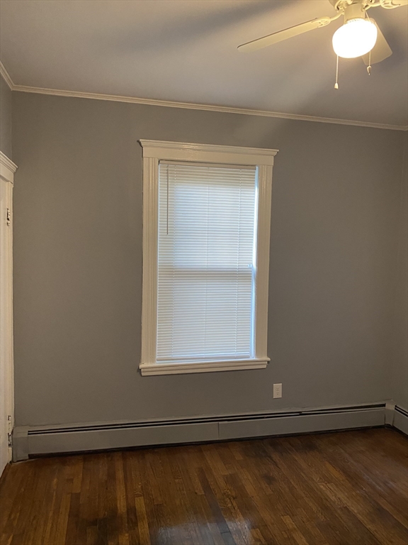 39 Pasadena Road, Unit 2 Boston, MA 02121 - Photo 26 of 29 a view of an empty room with a window