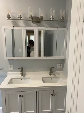 a bathroom with a toilet and a bathtub