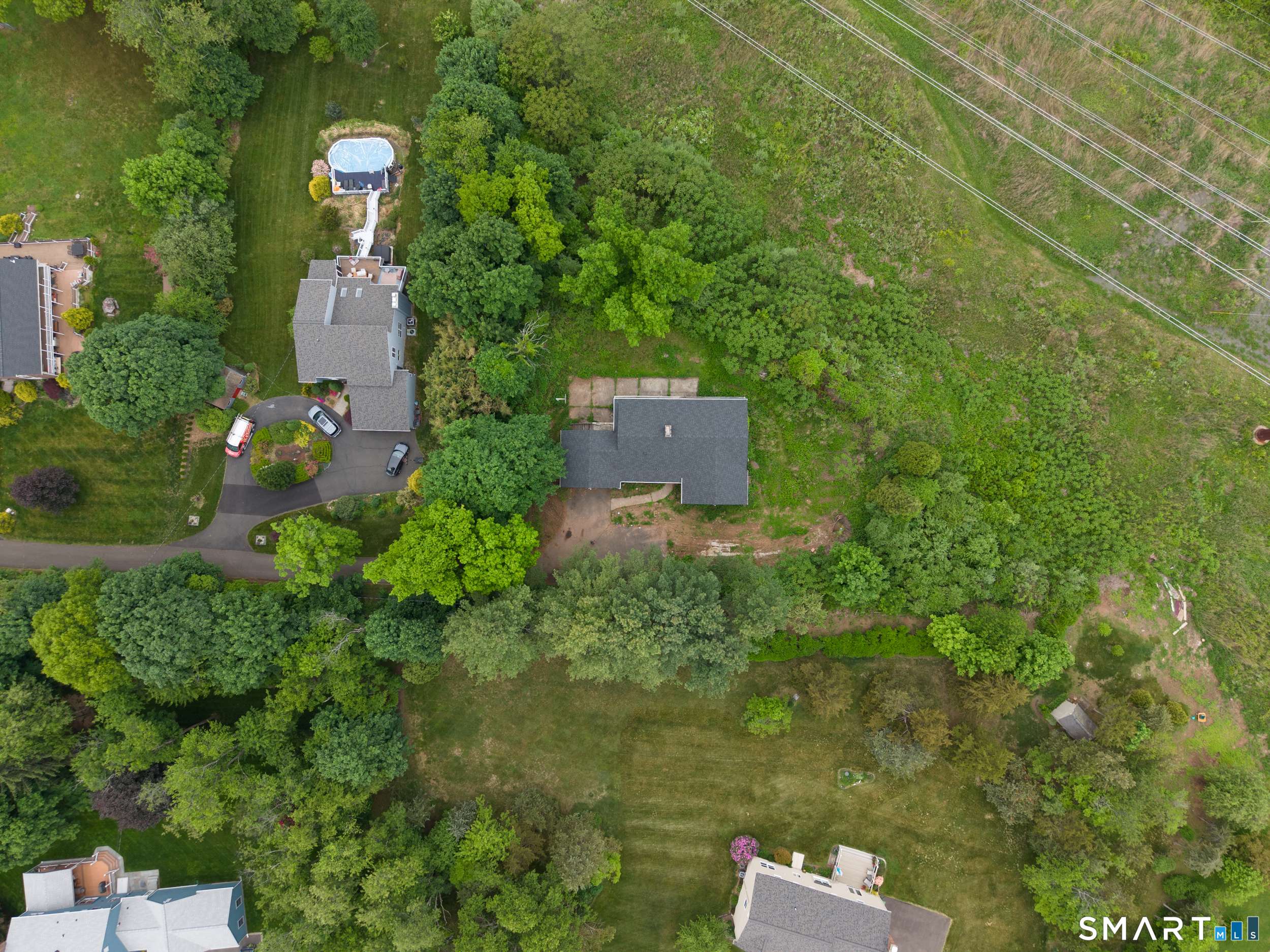 63 High Hill Road Wallingford, CT 06492 - Photo 34 of 34 an aerial view of a house with a yard