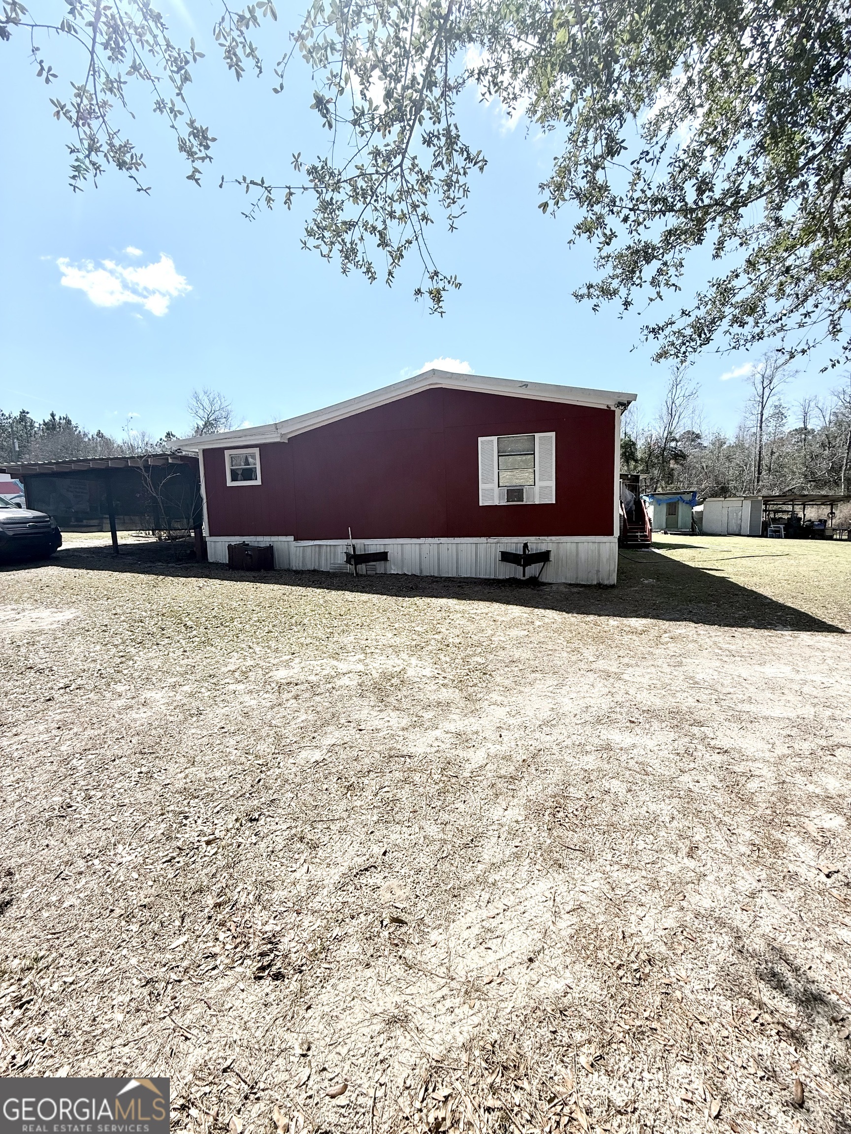 459 Louie Hightower Road Collins, GA 30421 - Photo 21 of 22 a view of an outdoor space and a yard