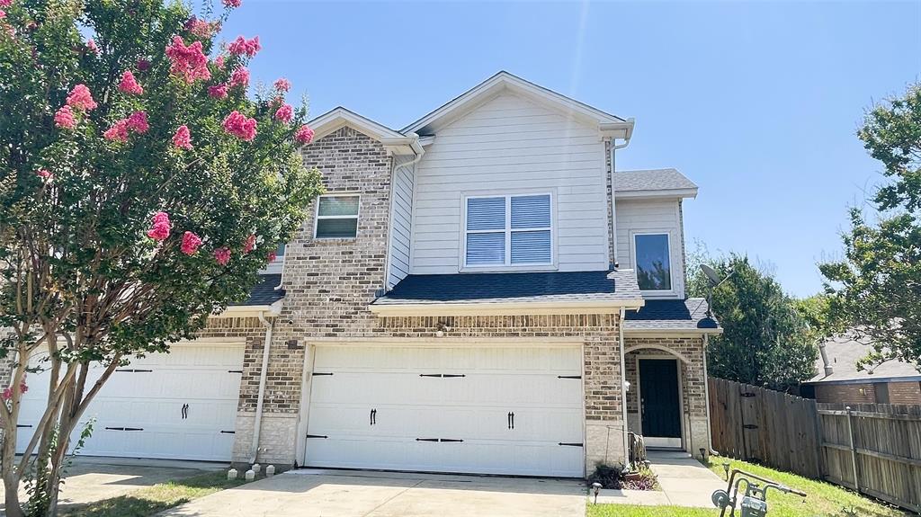 2815 Pasadena Lane Arlington, TX 76015 - Photo 1 of 1 a front view of a house with a garage