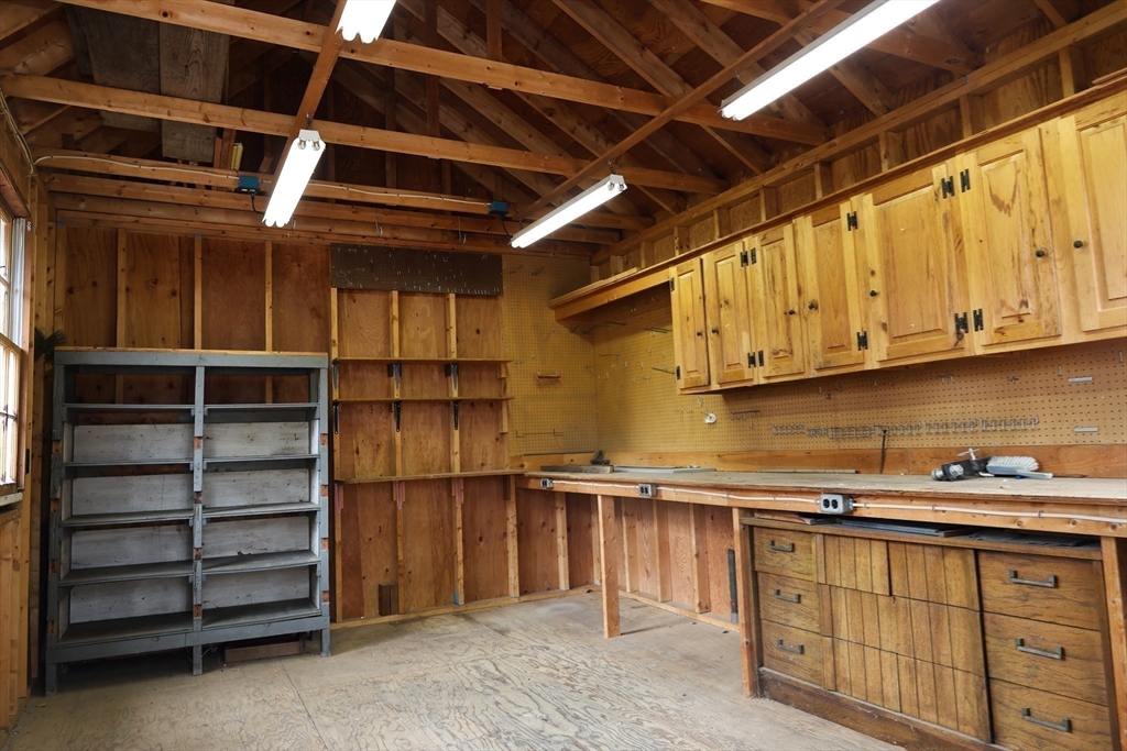 152 Central Street Georgetown, MA 01833 - Photo 22 of 26 a kitchen with storage and utility