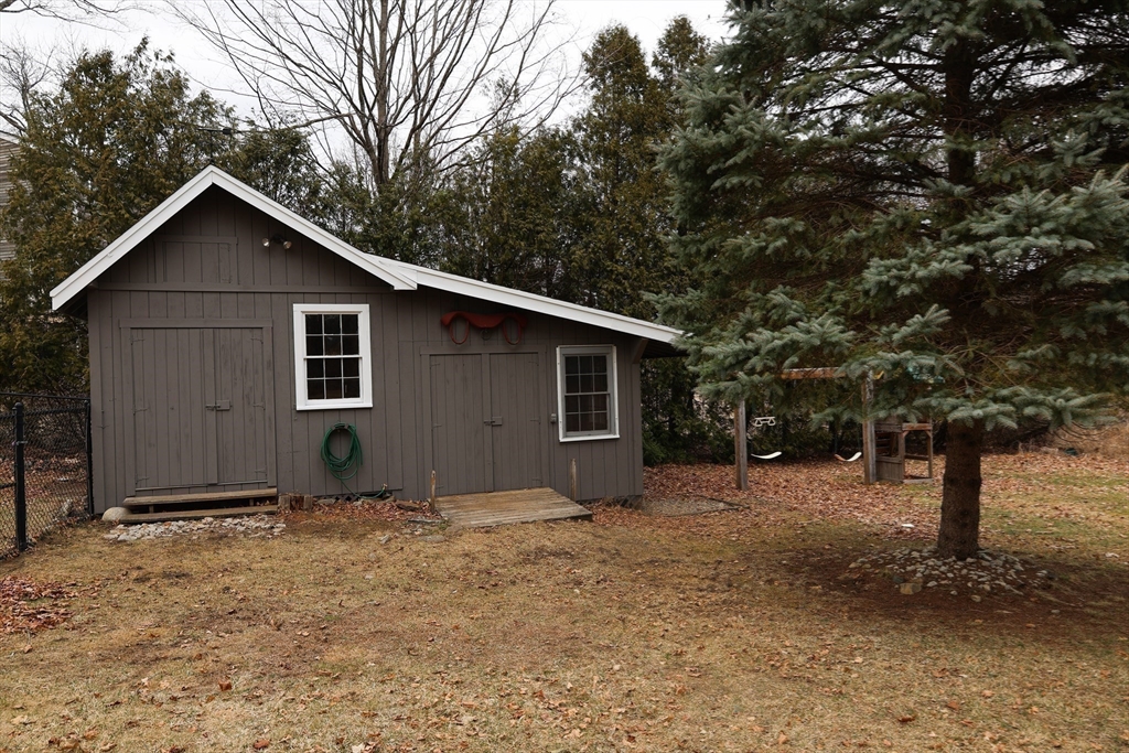 152 Central Street Georgetown, MA 01833 - Photo 26 of 26 a view of a house with a yard