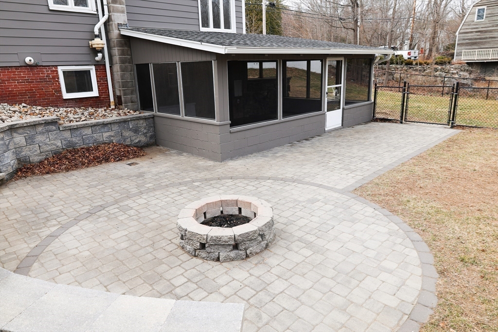 152 Central Street Georgetown, MA 01833 - Photo 3 of 26 a view of a house with a yard and a chair