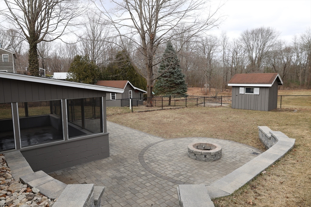 152 Central Street Georgetown, MA 01833 - Photo 4 of 26 a view of a house with a yard