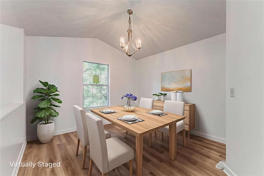 4379 Cross Lane Decatur, GA 30035 - Photo 15 of 19 a view of a dining room with furniture window and wooden floor
