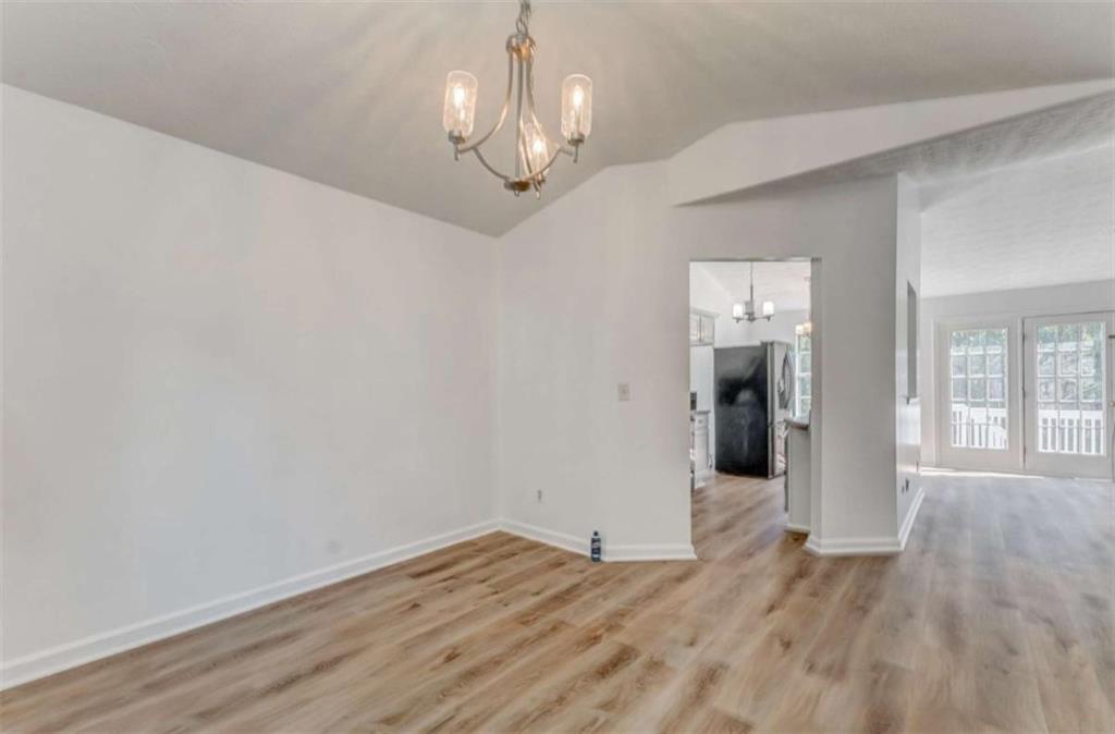4379 Cross Lane Decatur, GA 30035 - Photo 16 of 19 a view of empty room with wooden floor