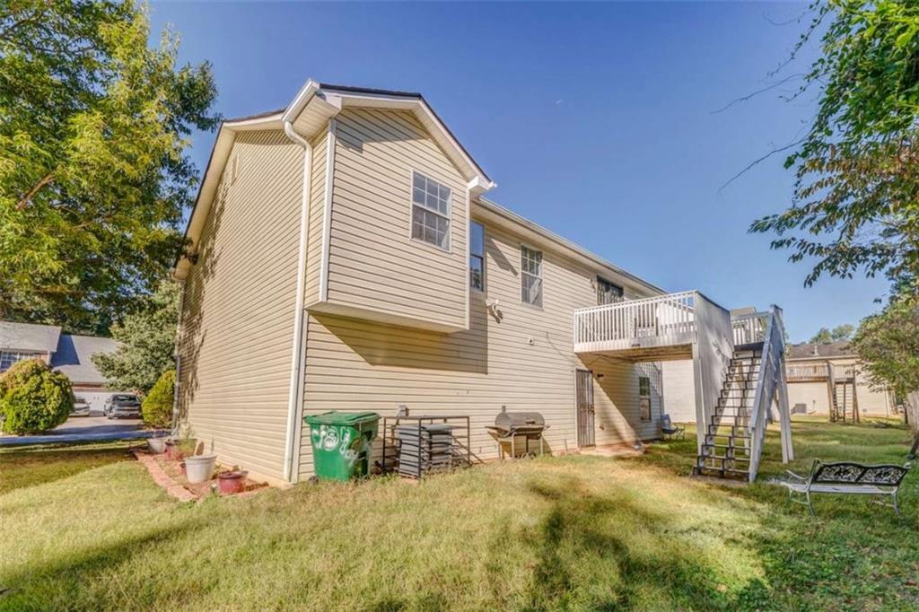 4379 Cross Lane Decatur, GA 30035 - Photo 17 of 19 a view of a house with a yard