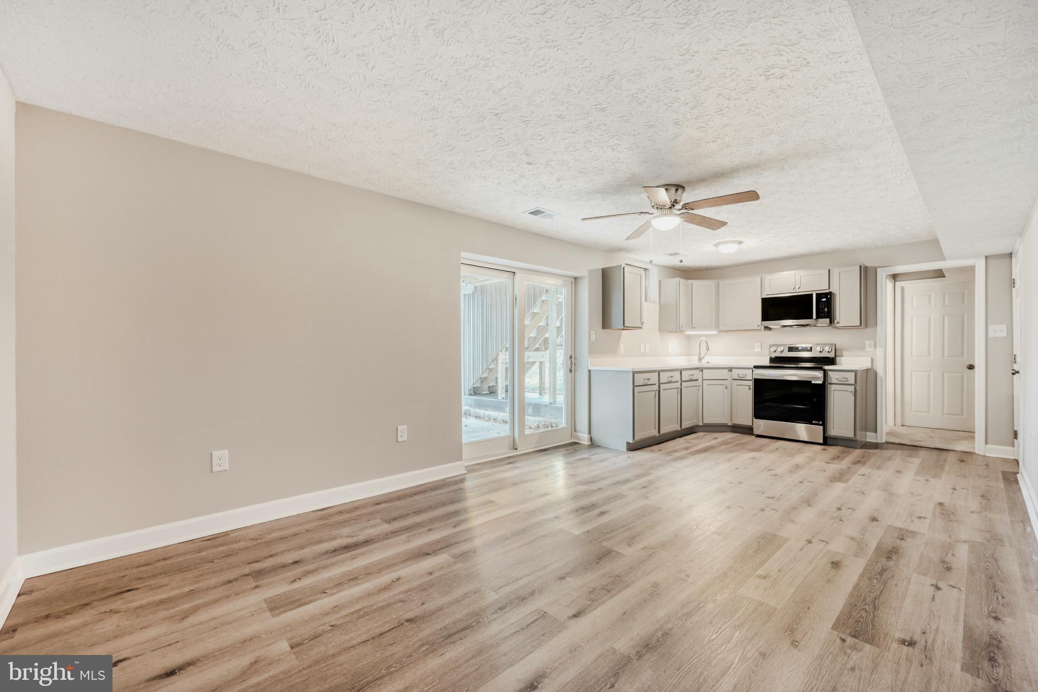 6351 Hanover Crossing Way Hanover, MD 21076 - Photo 16 of 34 Finished basement with kitchenette.