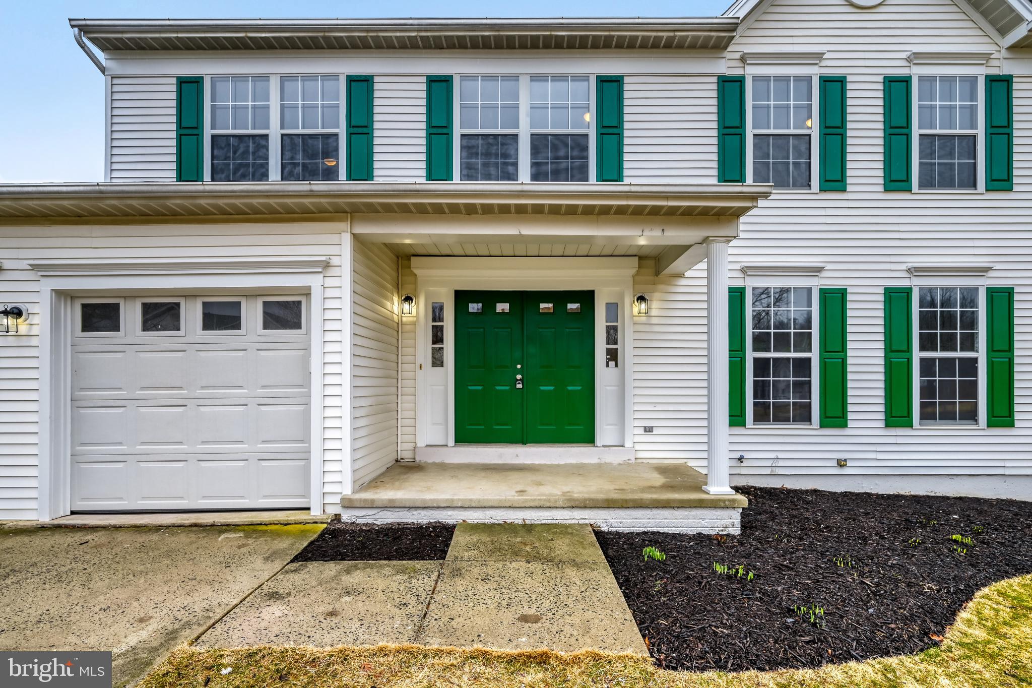 6351 Hanover Crossing Way Hanover, MD 21076 - Photo 2 of 34 Charming home with vibrant green accents.
