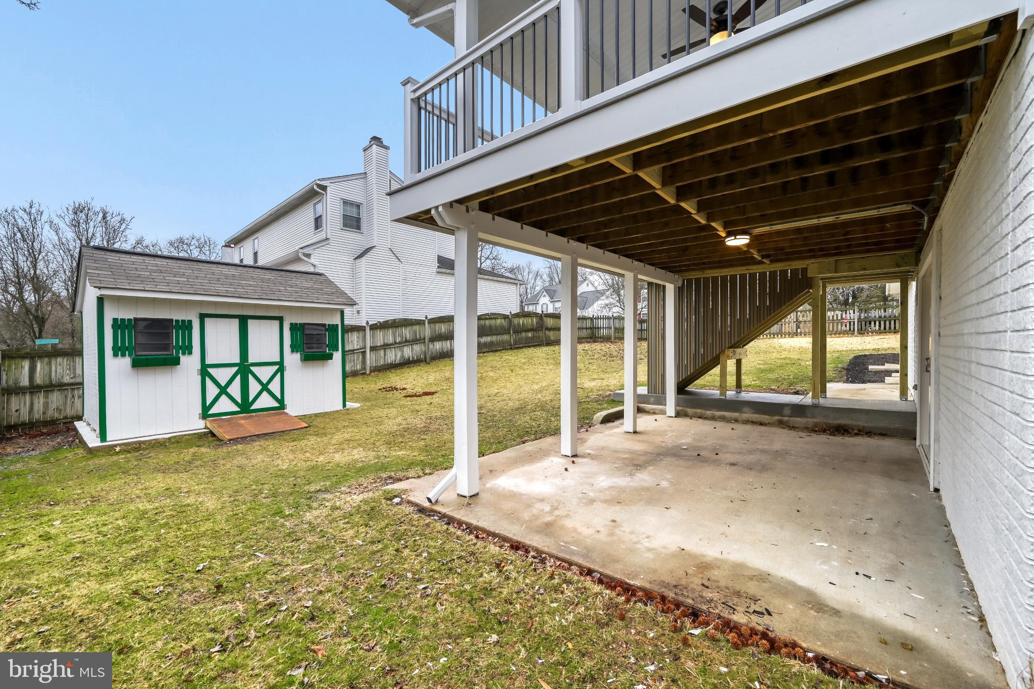 6351 Hanover Crossing Way Hanover, MD 21076 - Photo 30 of 34 Charming backyard with a cozy playhouse.