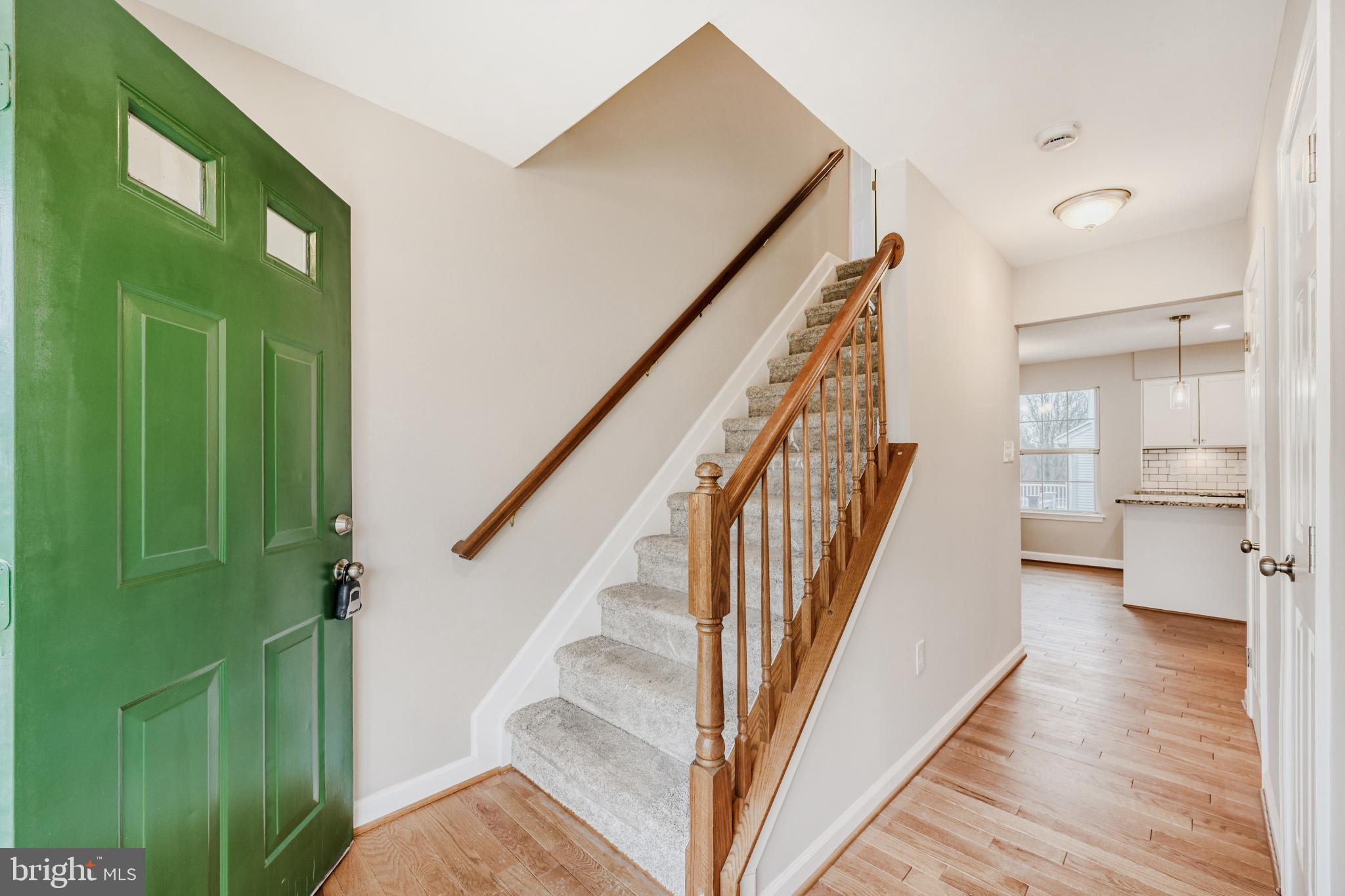 6351 Hanover Crossing Way Hanover, MD 21076 - Photo 6 of 34 Inviting entryway with charming green door.