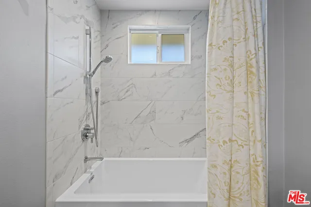 a bathroom with a bathtub