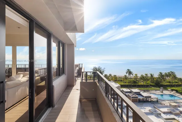 a view of balcony with furniture
