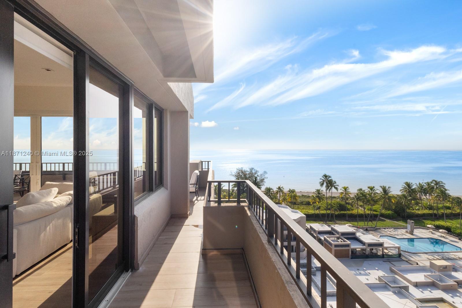 251 Crandon Boulevard, Unit 1036 Key Biscayne, FL 33149 - Photo 23 of 38 a view of balcony with furniture